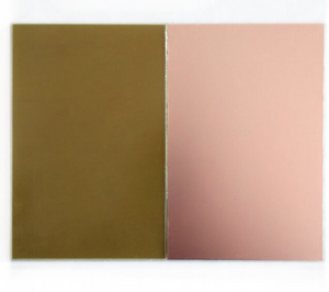 12×12 Fiber PCB Copper Glass Sheet Single Side | FR4 PCB Laminate - Digilog.pk - a rectangular sheet with a dark olive-green side and a smooth copper-coloured side.