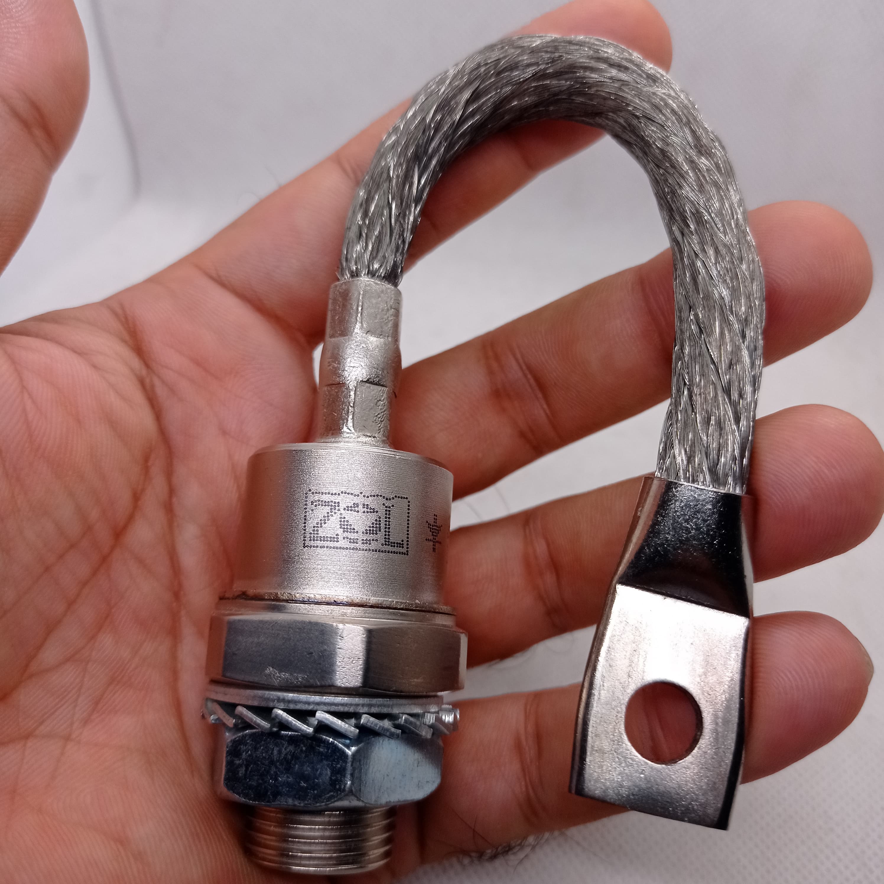 1200V 200A Diode Stud Type Diode 200U120 - shown as a silver-coloured stud-mount diode with a braided wire lead and a metal lug held in a hand.