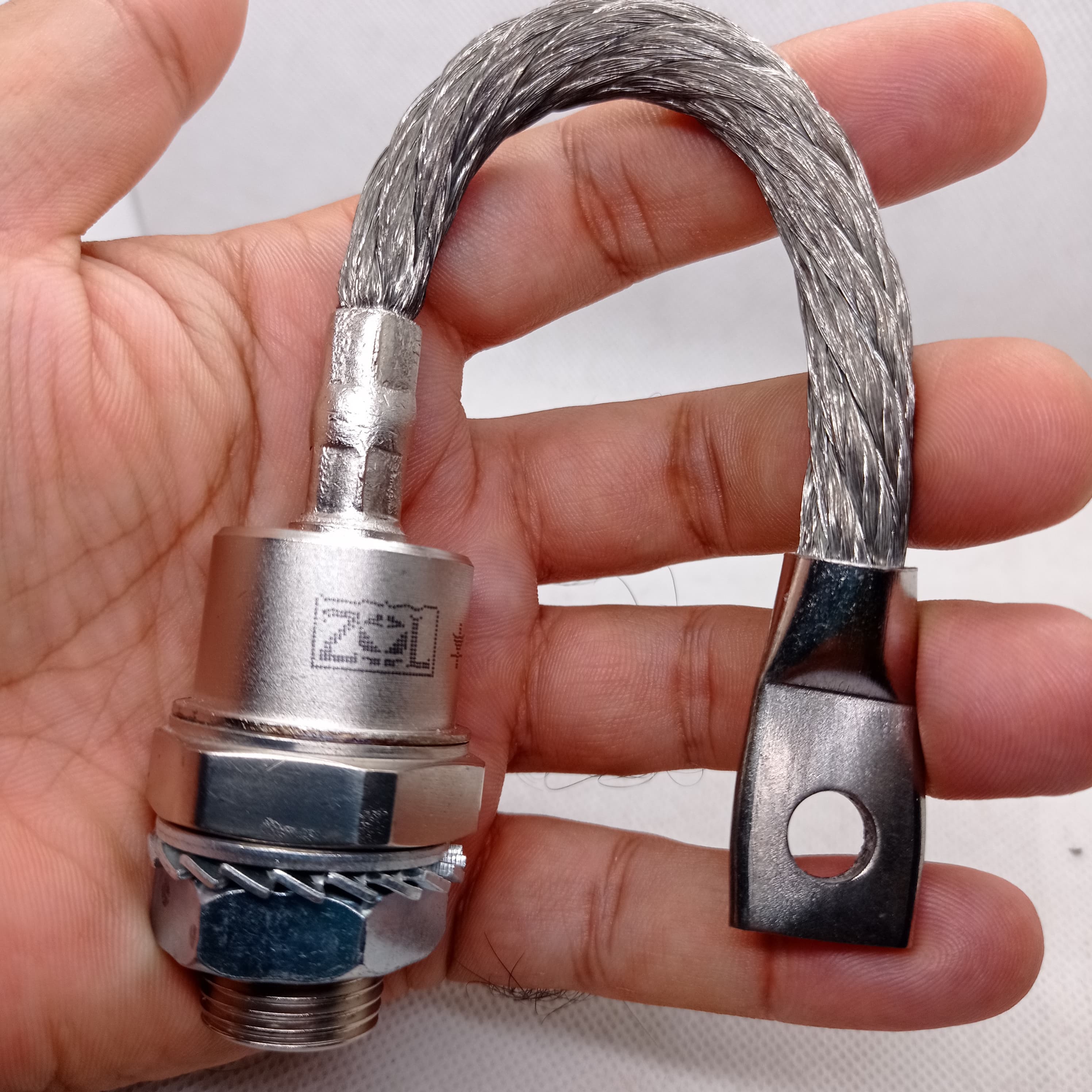 1200V 200A Diode Stud Type Diode 200U120 - a silver-coloured stud-mount diode with a braided metal cable and a terminal lug, held in a hand.