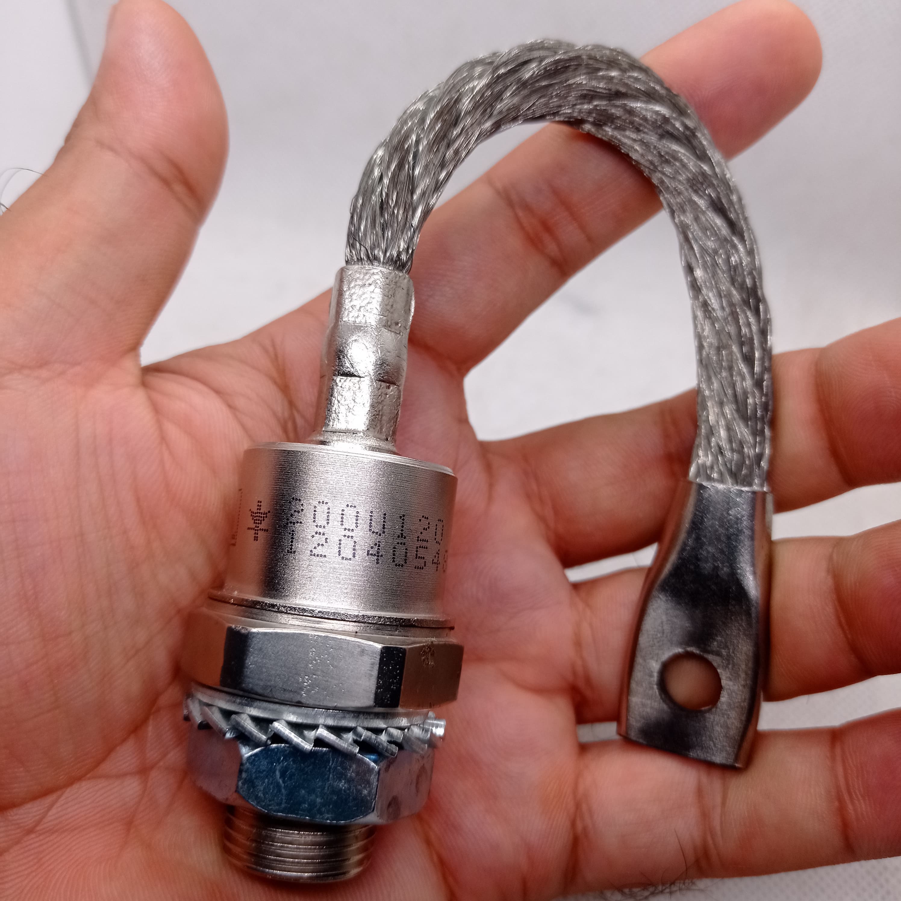 1200V 200A Diode Stud Type Diode 200U120 - a silver-coloured metal component with a threaded base, hexagonal nut, and a flexible braided wire lead with a lug terminal.