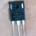 1200V 40amp G40T120 Crmicro IGBT - G40T120BK3SD IGBT, a black rectangular electronic component with three metal pins, held against a person's palm.