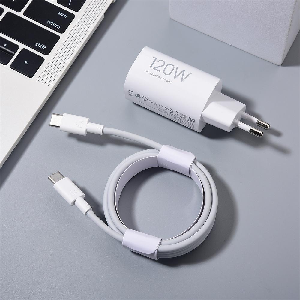 120W Original Xiaomi Turbo Fast Charger Eu Hypercharge Adapter With 6A C To C Cable - white USB-C to USB-C cable, shown next to a laptop keyboard on a grey surface.