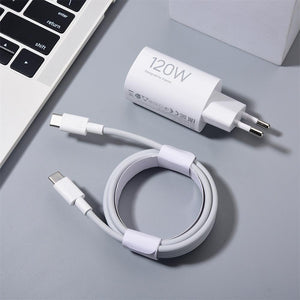 120W Original Xiaomi Turbo Fast Charger Eu Hypercharge Adapter With 6A C To C Cable - white USB-C to USB-C cable, shown next to a laptop keyboard on a grey surface.