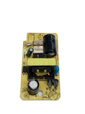 12V 1000mA 12V 1A Power Supply Isolated Switching Power Supply AC DC Power Supply - a yellow transformer, capacitors, and a fuse on a yellow PCB.