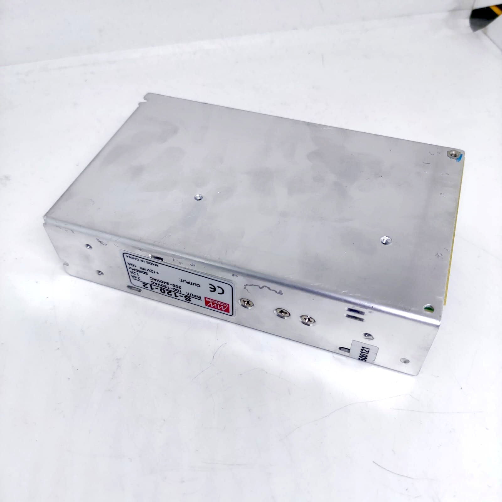12V 10A Max Well Power Supply - shown as a rectangular silver metal unit with a side label displaying input, output, and model S-120-12 specifications.