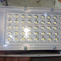12V 12W LED Light Flood Light Low Quality - a rectangular white-framed LED light with a transparent cover showing an array of small, circular LED bulbs.