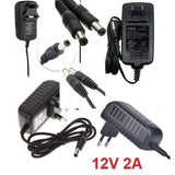 12V 2A Power Supply Adapter AC DC Switching Regulated Supply Refurnished - several black AC/DC switching power adapters with various plug types and DC barrel connectors arranged in a collage.