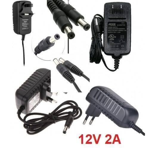 12V 2A Power Supply Adapter AC DC Switching Regulated Supply Refurnished - several black AC/DC switching power adapters with various plug types and DC barrel connectors arranged in a collage.