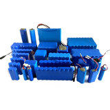 12V 30Ah Li-ion Battery Pack Local Manufactured - shown as a collection of various blue-wrapped lithium-ion battery packs with exposed wire leads.