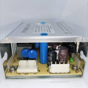 12V 3A 24V 0.5A 110-264VAC AC DC Switch Mode Power Supply - the internal circuit board, capacitors, two white connectors, and a green LED indicator.