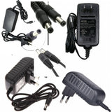 12V 3amp Power Adapter Used - shown in a collage of multiple black AC power adapters with attached cords and barrel connectors from various angles.
