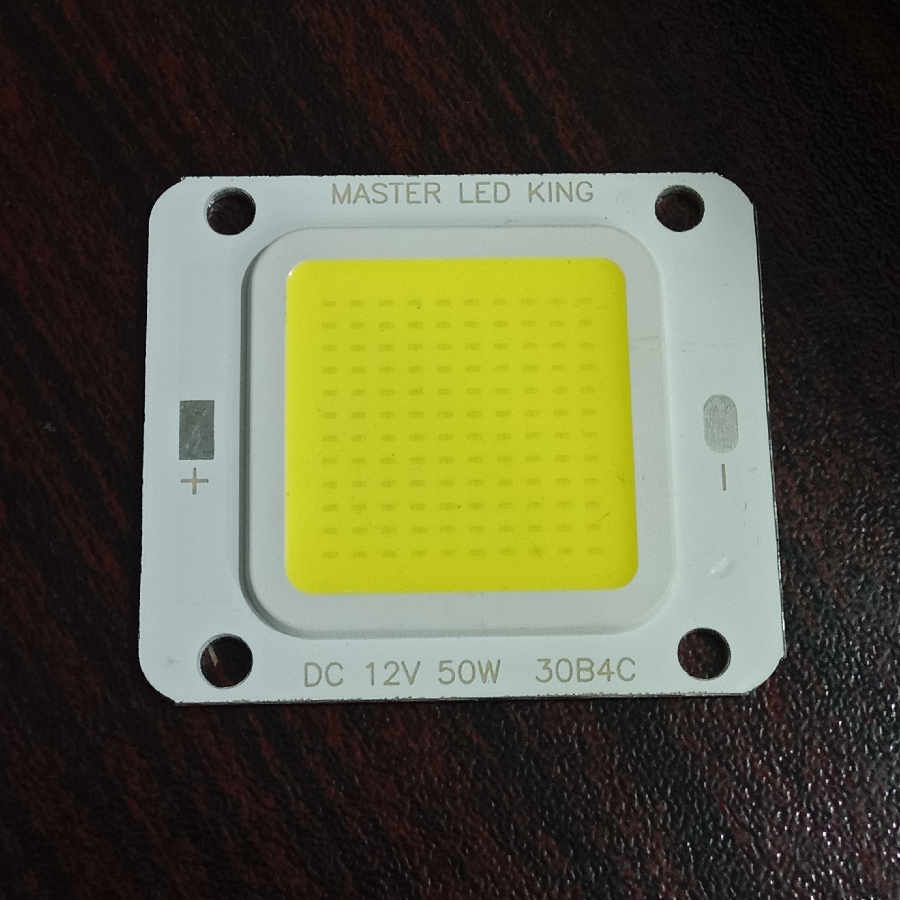 12V 50W Super Bright LED Beads Chip COB Light Module DIY - a square white chip with a central yellow light panel, marked with positive and negative terminals.