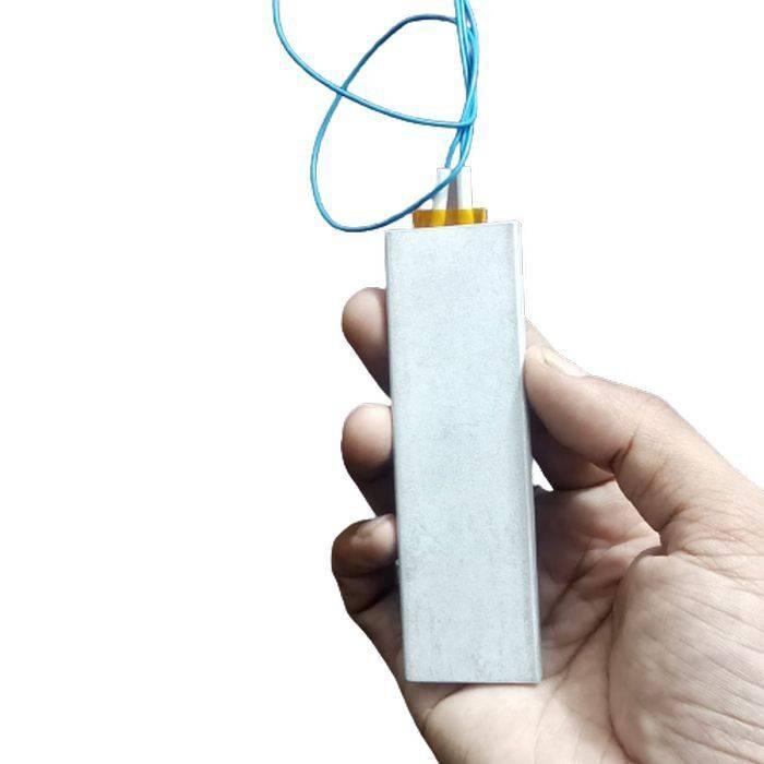 12V 60C 20W High Power Pt-c Heating Element Thermostatic Heater Plate 100MMX30MMX5MM - held in a hand, showing a rectangular silver plate with blue wires.