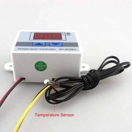 12V Digital Thermostat Temperature Controller XH-W3001 - a white rectangular device with a digital display, two blue buttons, and an attached temperature sensor.