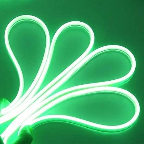 12V Green Neon Flexible Strip Light 1m Waterproof SMD 5050 Rope String Silicone Lamp Outdoor Lighting - shown as a glowing, bright green silicone strip bent into a four-loop fan shape held by a hand.