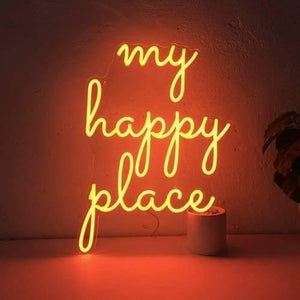12V Orange Neon Flexible Strip Light 1m Waterproof SMD 5050 Rope String Silicone Lamp Outdoor Lighting - shaped into the glowing orange text "my happy place" on a stand.