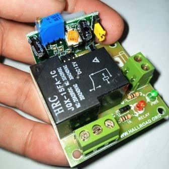 12V PIR Motion Sensor Switch Module - a black HRC relay, a blue potentiometer, green screw terminals, and two status LEDs.