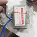 12V + 12V 2A Transformer 24V 2A Transformer - shown as a metal-cased component with blue and black wires, wrapped in clear plastic on a white surface.