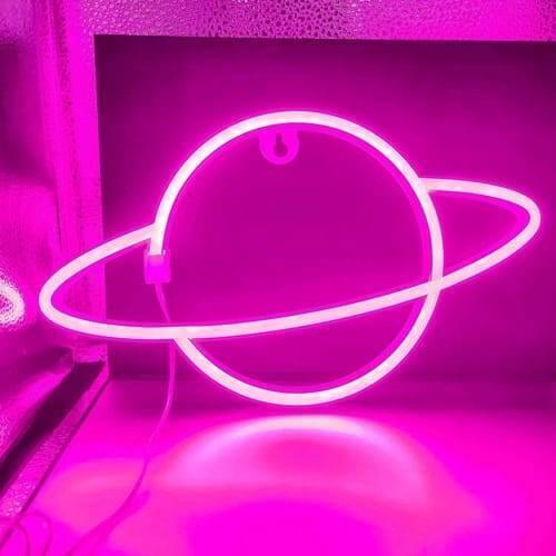 12V Purple Neon Flexible Strip Light 1m Waterproof SMD 5050 Rope String Silicone Lamp Outdoor Lighting - shaped into a glowing purple neon planet with a ring.