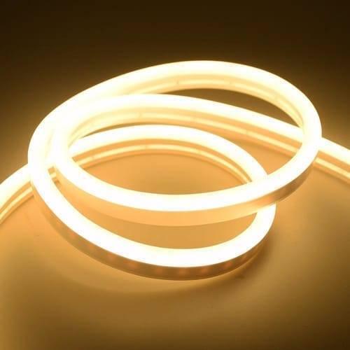 12V Warm White Neon Flexible Strip Light 1m Waterproof SMD 5050 Rope String Silicone Lamp Outdoor Lighting - shown as a coiled length of glowing, warm-white silicone LED rope light against a dark background.