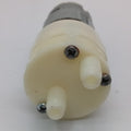 12V Water Cooler Pump stock lot - a close-up view of the white plastic pump head featuring two protruding nozzles and three Phillips head mounting screws.