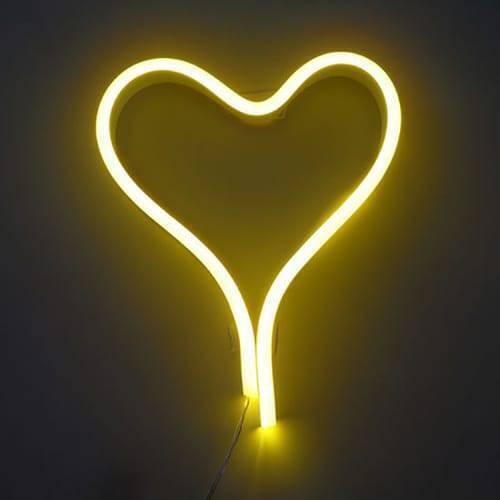 12V Yellow Neon Flexible Strip Light 1m Waterproof SMD 5050 Rope String Silicone Lamp Outdoor Lighting - shaped into a glowing yellow heart against a dark background.