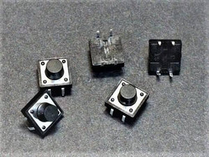 12x12x7.5mm Tactile Push Button Switch - five black square tactile switches with circular push buttons arranged on a grey surface.