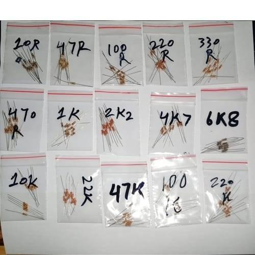150pcs Resistor Pack Of 15 Values 10R,47R,100R,220R,330R,470R,1k,2.2k,4.7k,6.8k,10k,22k,47k,100k,220k - 15 small clear plastic bags containing various brown cylindrical resistors, each labeled with its resistance value in black ink.