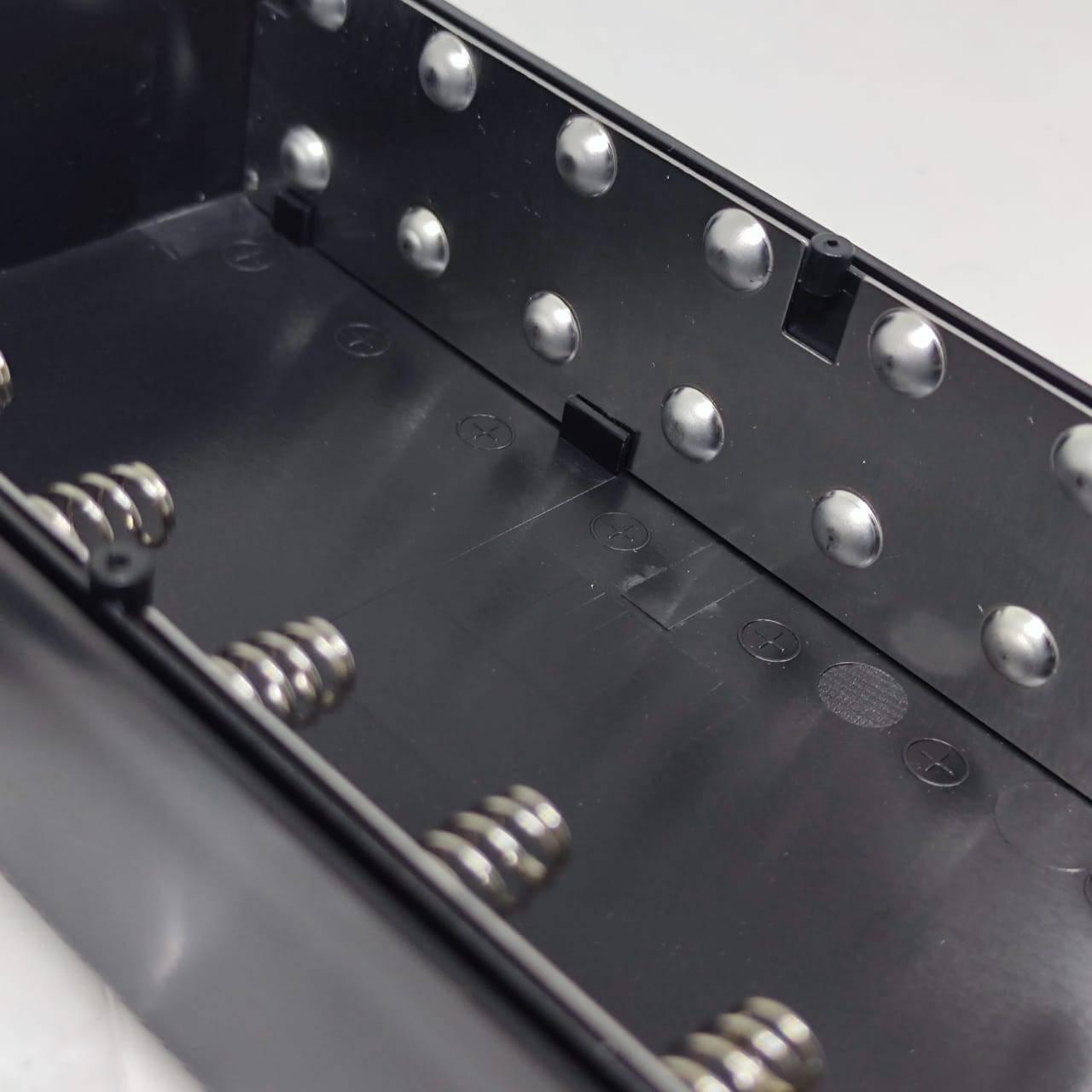 16*18650 Battery Storage Box Pd QC3.0 Quick Charge DIY Power Bank Box Case Without Cell - a close-up view of the empty black plastic interior showing the spring-loaded battery contacts and cell compartments.