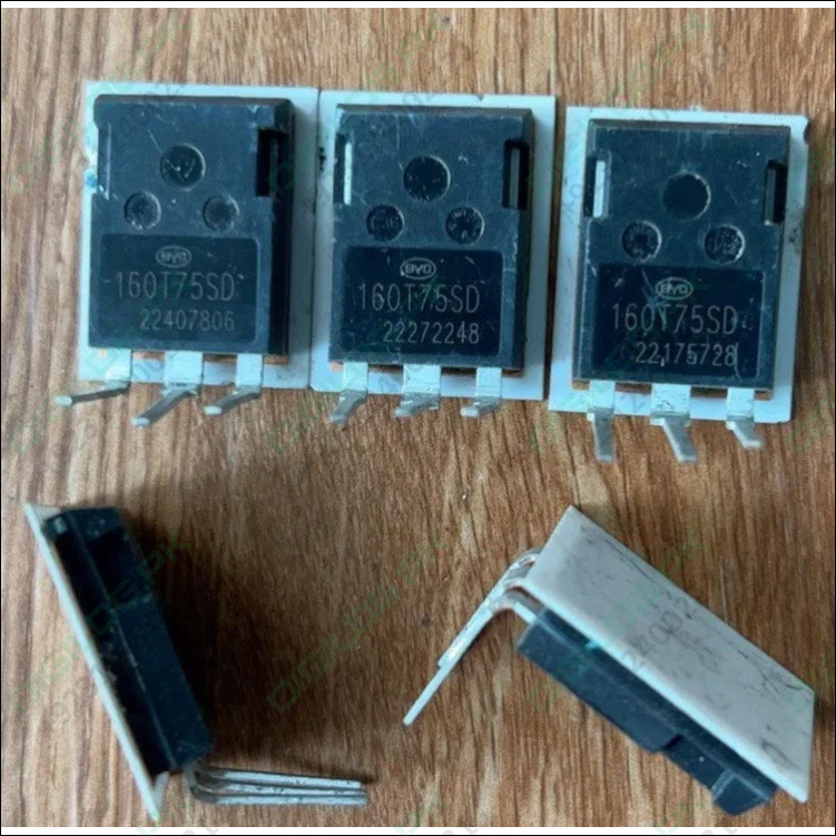 160A 750V IGBT BYD160T75SD BGM160T75SD - BYD160T75SD IGBTs showing five black electronic components with three metal pins each, three arranged in a row and two lying on their sides.