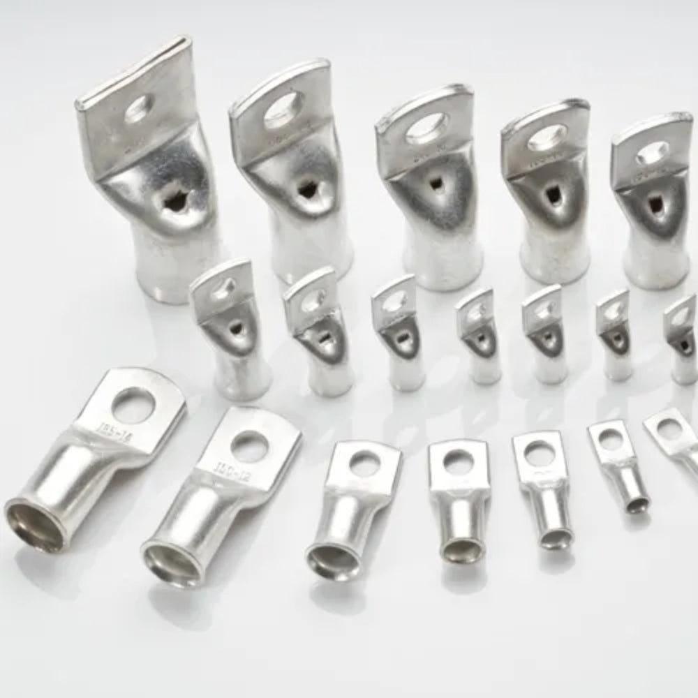 16mm Copper Cable Lug with 5mm Bolt Hole | High Conductivity Thimble Lug - collection of silver-colored, tubular metal cable lugs of various sizes arranged on a white background.