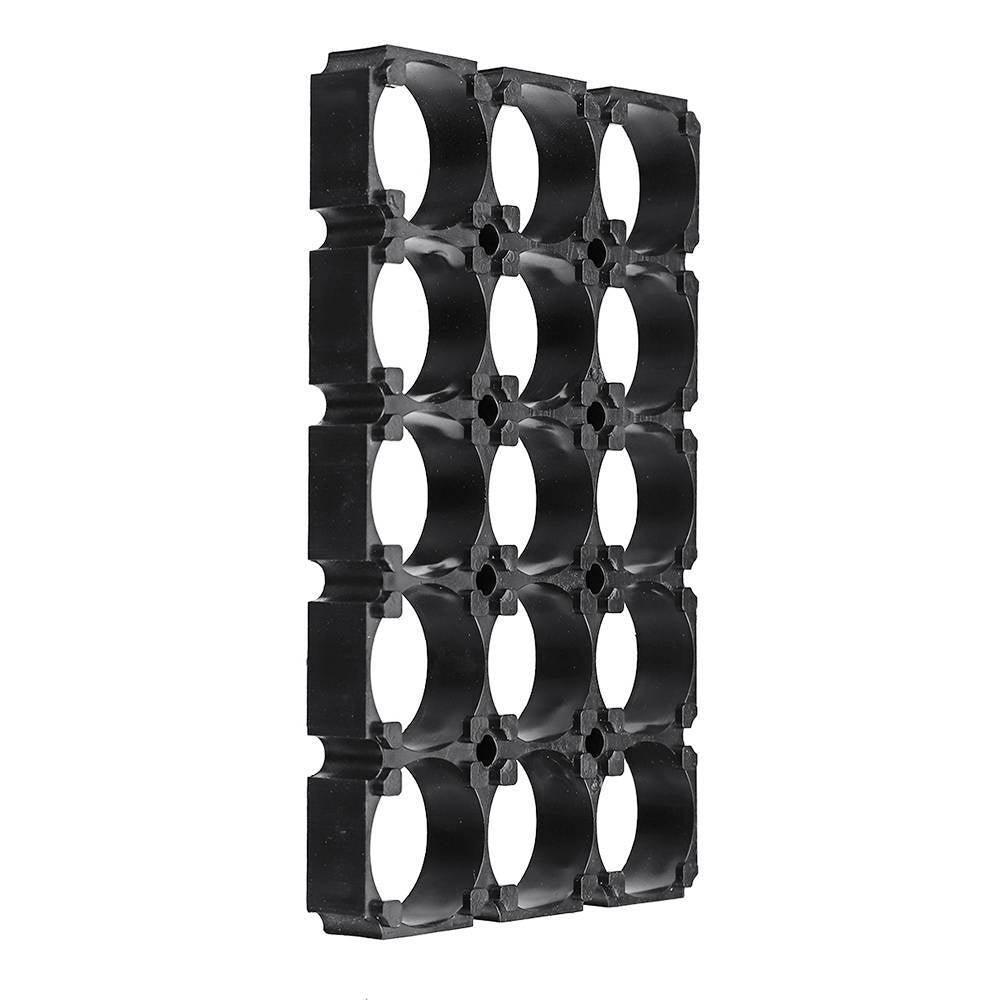 18650 Battery Holder 3x5 Cell 18650 Batteries Spacer Holders Radiating Plastic Holder Bracket For DIY Battery Pack - a black plastic grid bracket with fifteen circular slots arranged in three columns and five rows for mounting batteries.
