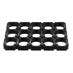 18650 Battery Holder 3x5 Cell 18650 Batteries Spacer Holders Radiating Plastic Holder Bracket For DIY Battery Pack - a black plastic grid bracket with fifteen circular slots arranged in a three-by-five rectangular configuration.