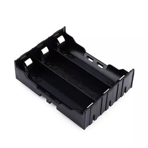 18650 Battery Holder - PCB - 3 Cell | Secure Battery Mount - a black plastic rectangular mount with three open slots for batteries and integrated metal contact terminals.