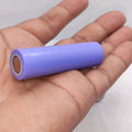 18650 Lithium Ion Cell refurb - shown as a single cylindrical battery with a light purple wrapper held in a person's palm.