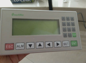 19264 LCD 92*64 Electronic Display Components Graphics Modules LCD Display Monitors LCD Modules - a grey rectangular TouchWin display unit with a blank screen, a numeric keypad, and function buttons below.