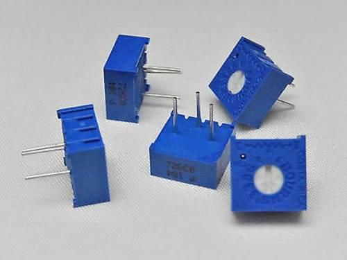 1k 3386 Single Turn Variable Potentiometer - five blue square-shaped electronic components with white adjustment screws and three metal pins.