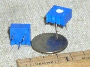 1k 3386 Single Turn Variable Potentiometer - shown as two blue square components with three metal pins and a white adjustment screw on top next to a coin.