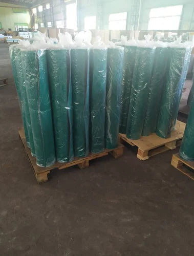 1m*1m*2mm Antistatic ESD Floor Mat/ESD Rubber Table Mat For Production/S5 PVC Antistatic Workbench Rubber Mat - shown as multiple rolls of green rubber material wrapped in clear plastic packaging and stacked on wooden shipping pallets.