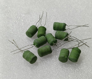 1mH Power Inductor ±10% 0.2A Radial - shown as a collection of small, green, cylindrical-shaped components with two wire leads each.