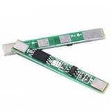 1s 3A 3.7V Li-ion BMS Pcm Protection Board Without Wire For 18650 Lithium Lion Battery - two green rectangular circuit boards with metal contact pads and surface-mounted electronic components.