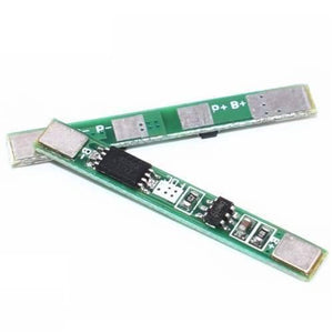 1s 3A 3.7V Li-ion BMS Pcm Protection Board Without Wire For 18650 Lithium Lion Battery - two green rectangular circuit boards with metal contact pads and surface-mounted electronic components.