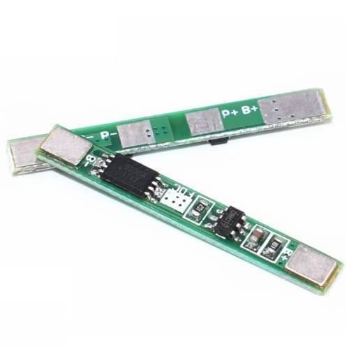 1s 3A 3.7V Li-ion BMS Pcm Protection Board Without Wire For 18650 Lithium Lion Battery - two green rectangular circuit boards with metal contact pads and surface-mounted electronic components.