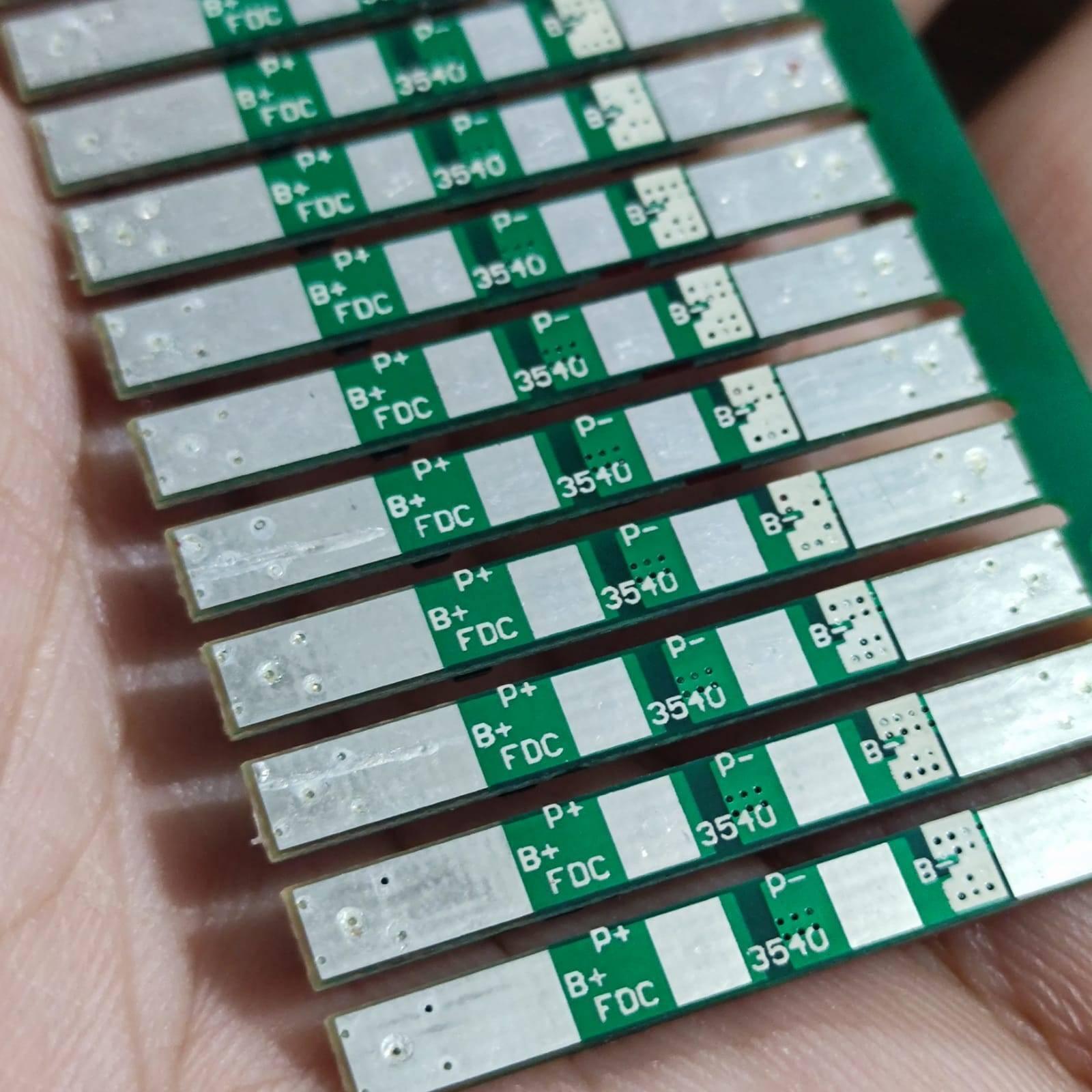 1s 4A BMS Module For Li Ion Batterey 259-fdc-3540 - a panel of multiple green rectangular circuit boards with labeled B+, P+, P-, and 3540 markings.