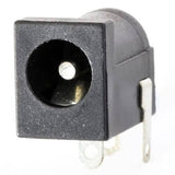 2.1x5.5mm DC Jack PCB Mount Internal Barrel Connector - a black plastic DC power jack with a central metal pin and three silver-colored terminal pins.