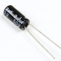 2.2uF 50V Electrolytic Capacitors - a small black cylindrical electronic component with two long metal wire leads extending from one end.