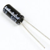 2.2uF 50V Electrolytic Capacitors - a small black cylindrical electronic component with two long metal wire leads extending from one end.