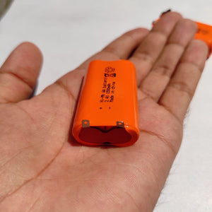 2.4V 1000mAh AA Long-lasting Rechargeable Battery - shown as an orange, two-cell battery pack with metal solder tabs held in a person's hand.