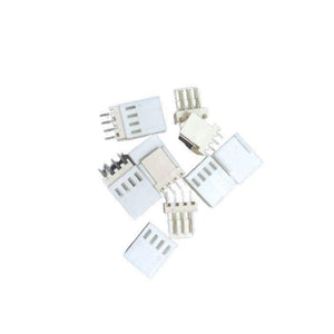 2.54mm 4-pin Male Female Connector - a scattered collection of white plastic 4-pin male and female header connectors.