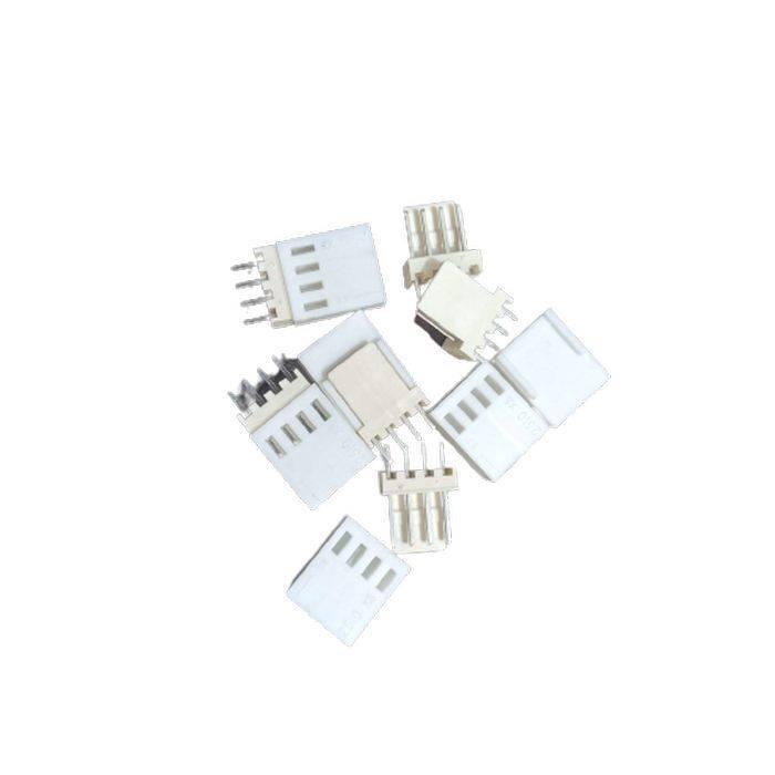 2.54mm 4-pin Male Female Connector - a scattered collection of white plastic 4-pin male and female header connectors.